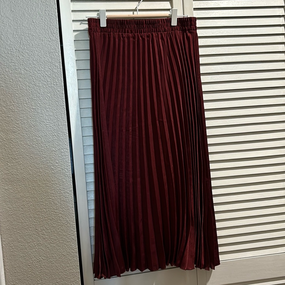 Pleated satin skirt